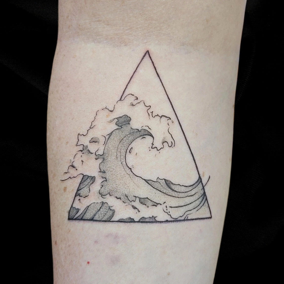 wave tattoo by Mary Kuzmin