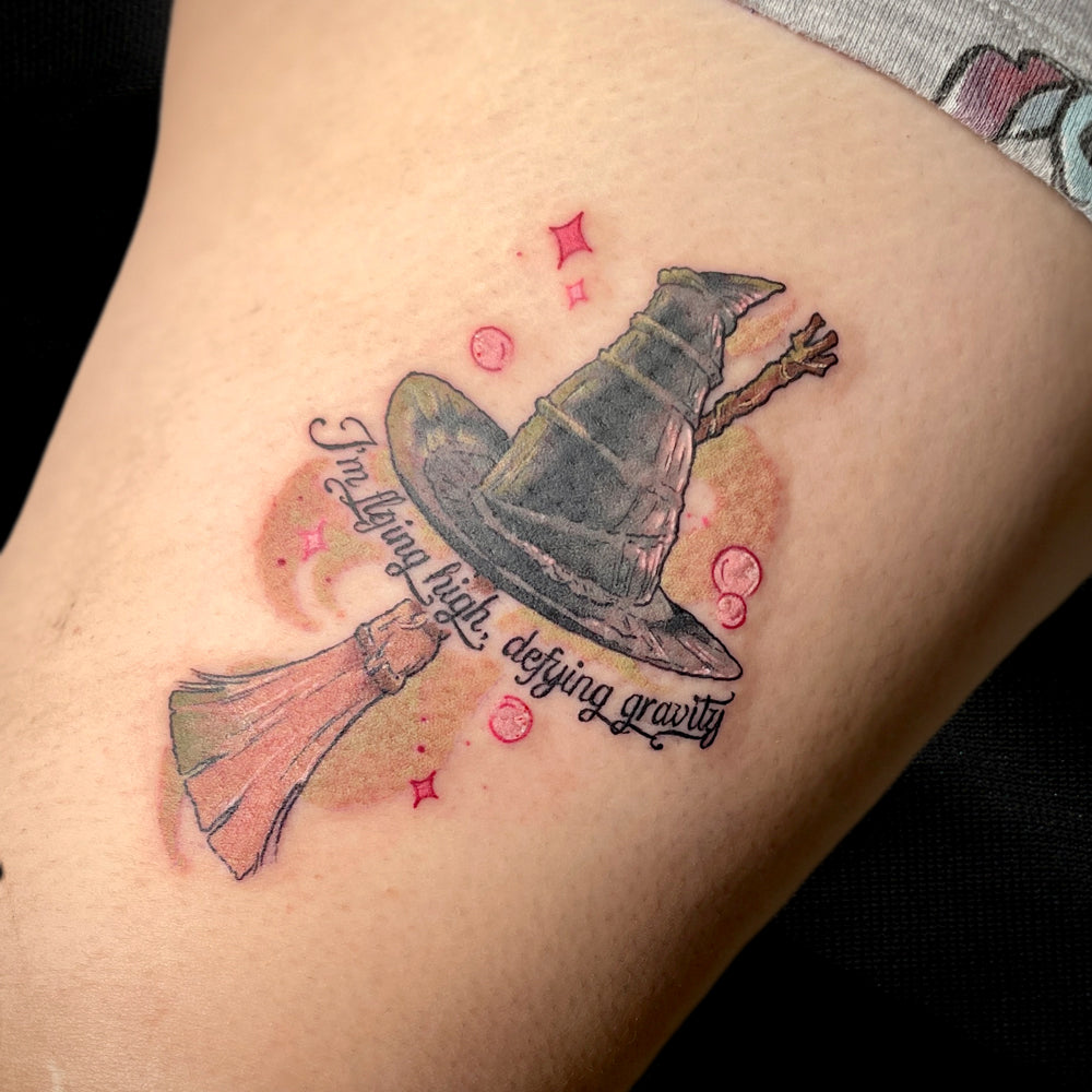 wicked witch hat tattoo defying gravity by Cass Brown