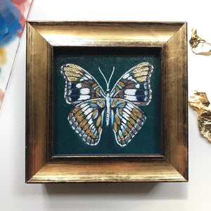 tiny teal, white and gold leaf butterfly original painting in a gold frame
