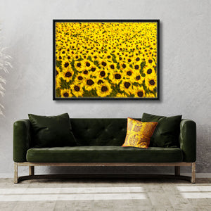 canvas sunflower painting print framed over sofa