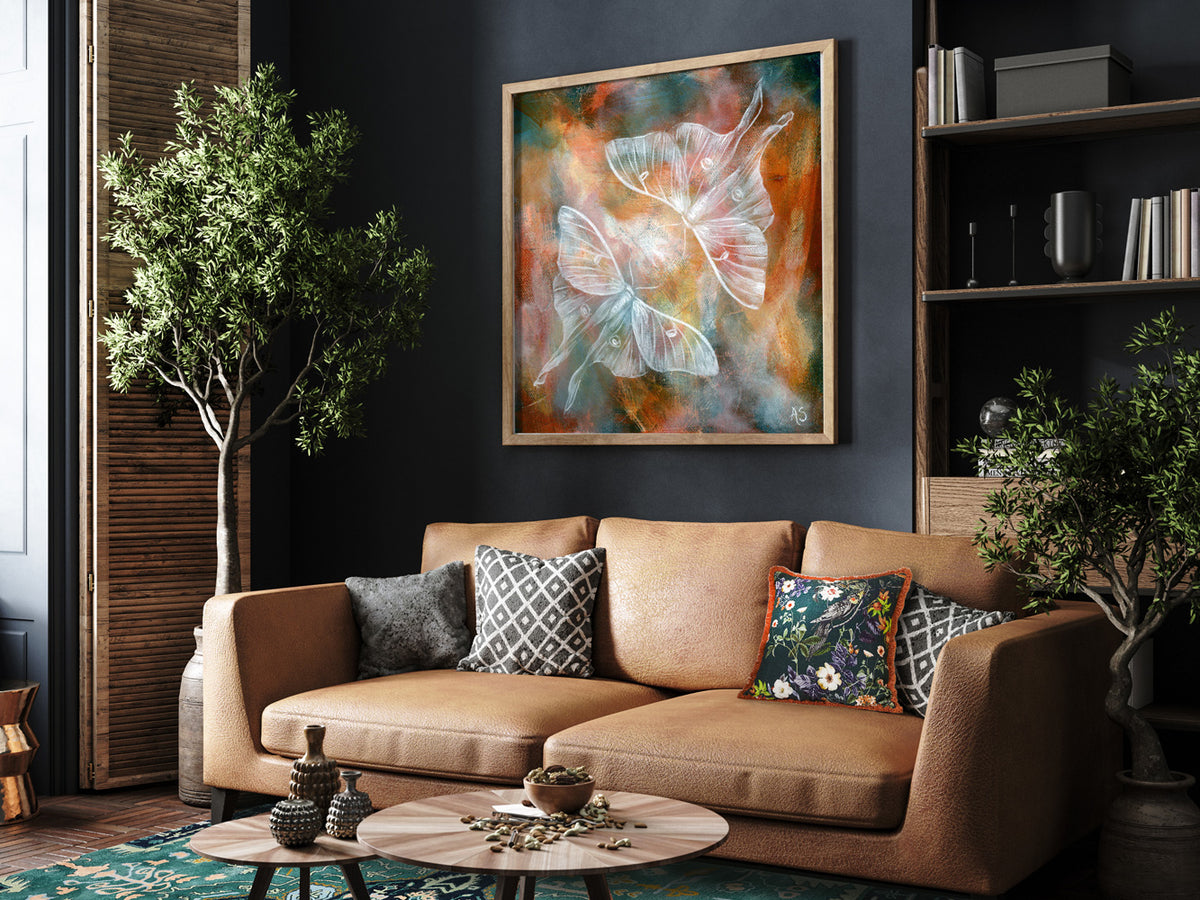 ethereal moth art print over sofa