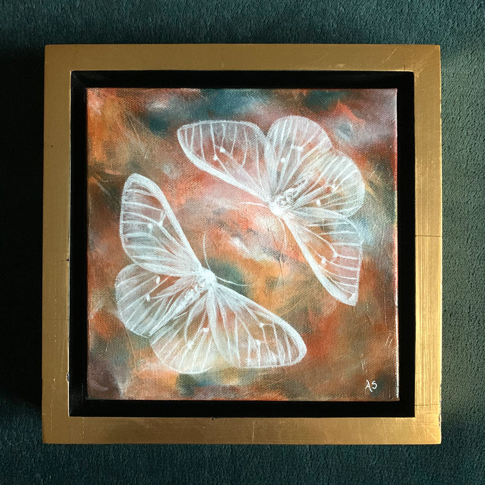Ethereal moths colorful original painting by Aimee Schreiber in a gold floater frame
