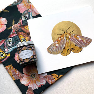 moonrise garden moth flower tea towel art print candle gift set