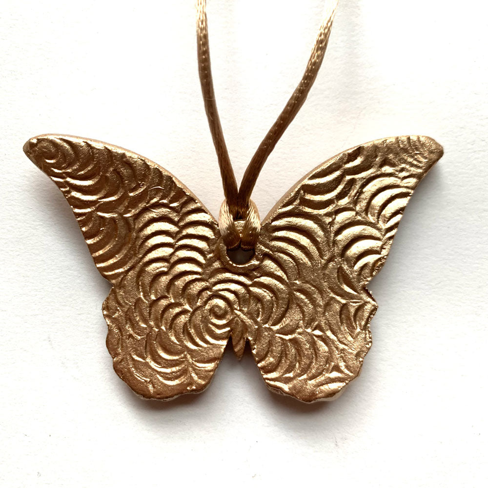 pink, orange, gold butterfly ornament back