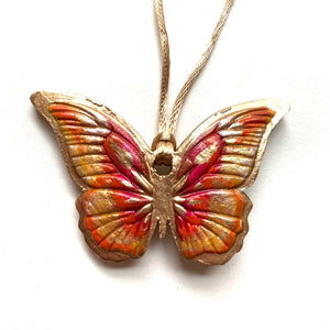 pink, orange, gold butterfly ornament 