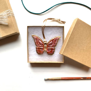 Rust, pink, gold butterfly ornament in gift box