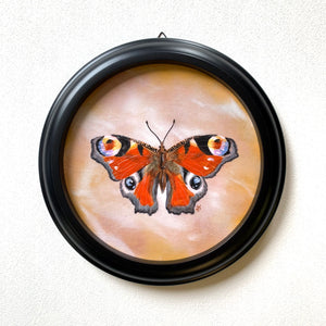 red peacock butterfly round painting in black frame