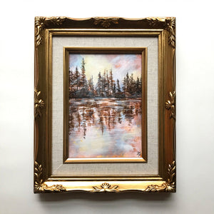 Reflections II Lake Landscape painting in gold frame on white wall by Aimee Schreiber