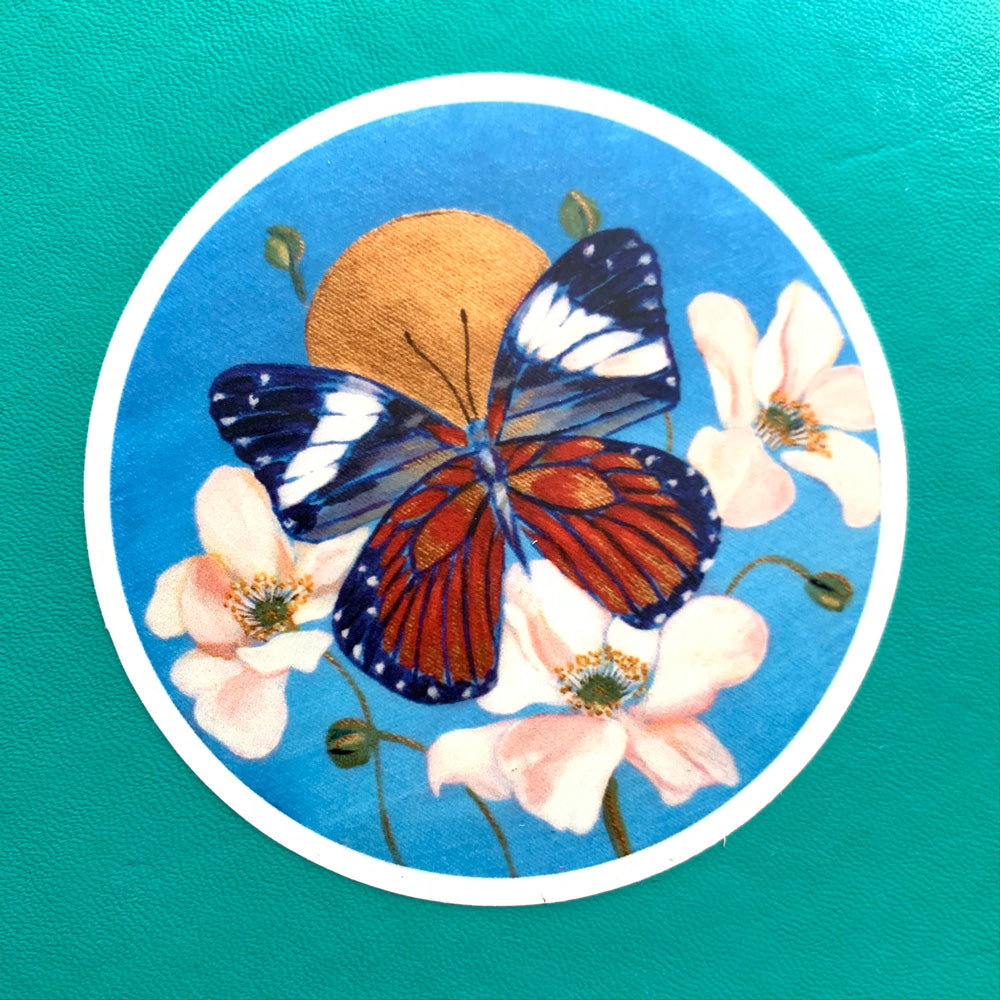 https://thecopperwolf.com/cdn/shop/products/round-blue-butterfly-sticker-detail_1200x.jpg?v=1655842456