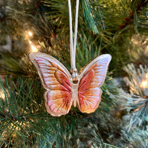 blush, rust and gold butterfly ornament on tree