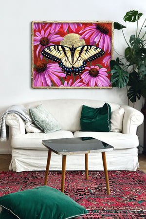 yellow butterfly art print with purple flowers hanging on wall over white sofa