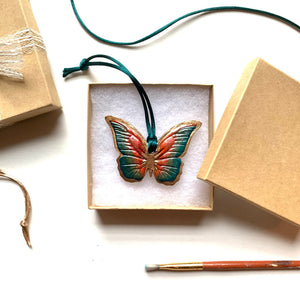 teal rust gold butterfly ornament with teal ribbon in gift box