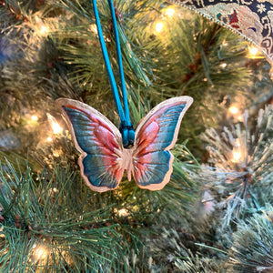 teal rust gold butterfly ornament on tree