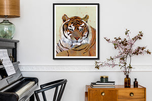 tiger art print framedon wall